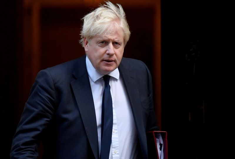 &copy; Reuters. Britain's Prime Minister Boris Johnson walks outside Downing Street in London, Britain October 20, 2021. REUTERS/Toby Melville