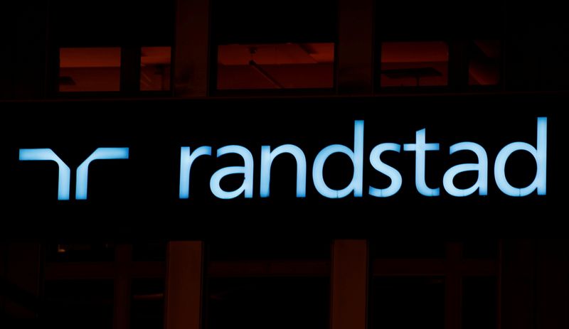 &copy; Reuters. FILE PHOTO: The logo of personnel service provider Randstad is seen at an office building in Zurich, Switzerland October 2, 2018.  REUTERS/Arnd Wiegmann/File Photo