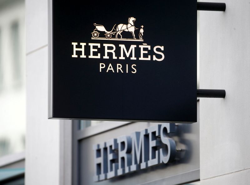 &copy; Reuters. FILE PHOTO: The logo of French luxury group Hermes is seen at a store, as the spread of the coronavirus disease (COVID-19) continues, in Zurich, Switzerland February 17, 2021. REUTERS/Arnd Wiegmann/File Photo