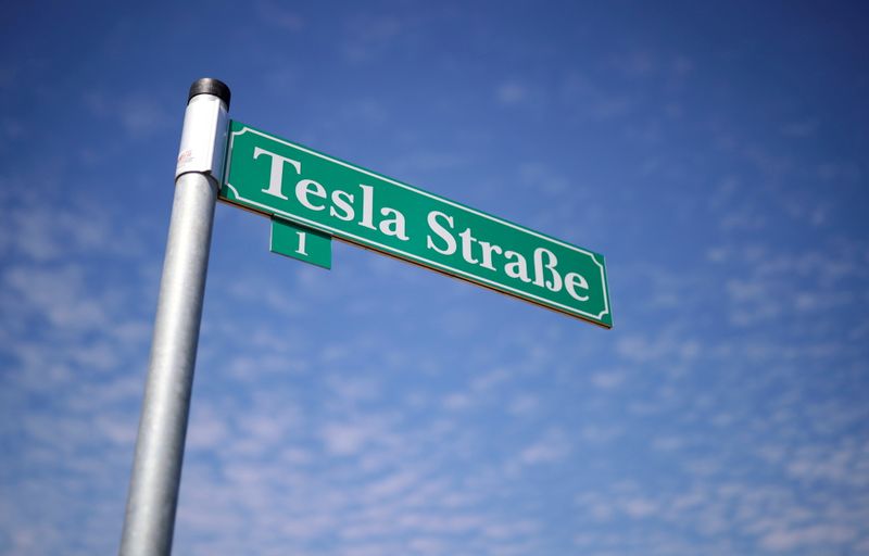 &copy; Reuters. FILE PHOTO: A sign that reads "Tesla Street" is pictured outside the construction site of the future Tesla Gigafactory, in Gruenheide near Berlin, Germany, August 12, 2021. REUTERS/Hannibal Hanschke/File Photo