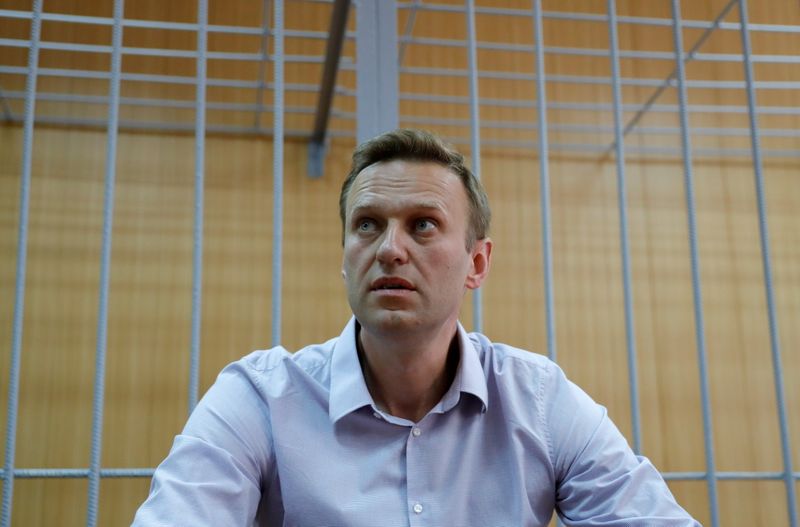 &copy; Reuters. FILE PHOTO: Russian opposition leader Alexei Navalny, who was detained at a recent protest called under the slogan "Putin is not our tsar", attends a court hearing in Moscow, Russia May 15, 2018. REUTERS/Tatyana Makeyeva/File Photo