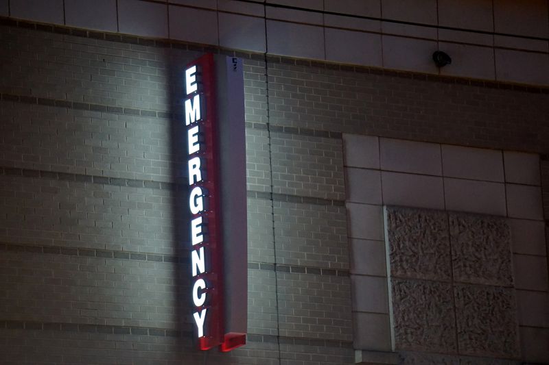 &copy; Reuters. An emergency sign illuminates outside of George Washington University Hospital, one of roughly 400 Universal Health Services, Inc (UHS) facilities across the United States and the U.K., in Washington, D.C., September 29, 2020.  REUTERS/Raphael Satter/File