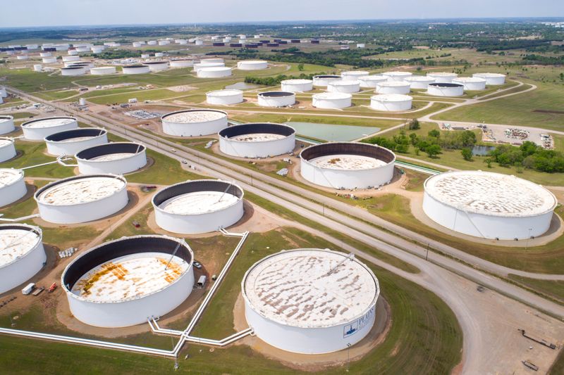 &copy; Reuters. Crude oil storage tanks are seen in an aerial photograph at the Cushing oil hub in Cushing, Oklahoma, U.S. April 21, 2020. REUTERS/Drone Base