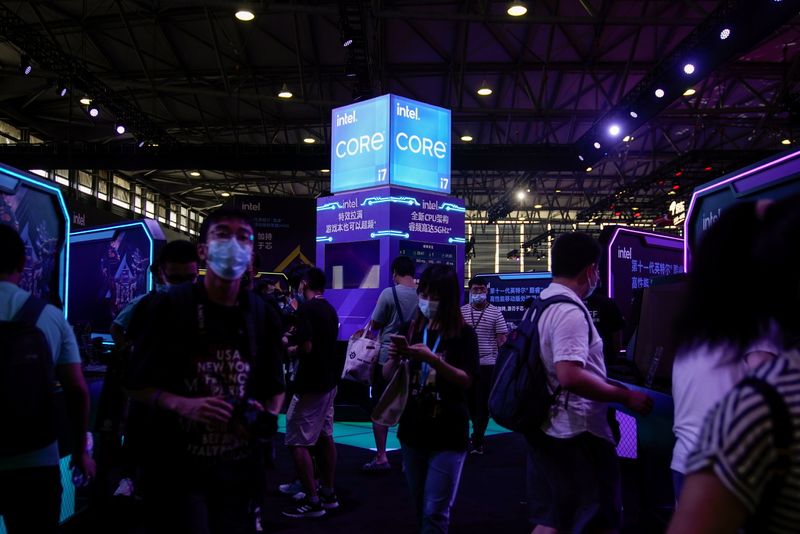 &copy; Reuters. Visitors are seen at the Intel booth during the China Digital Entertainment Expo and Conference, also known as ChinaJoy, in Shanghai, China July 30, 2021.  REUTERS/Aly Song