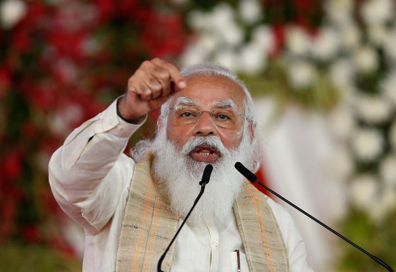 &copy; Reuters. FILE PHOTO: India's Prime Minister Narendra Modi addresses a gathering before flagging off the "Dandi March", or Salt March, to celebrate the 75th anniversary of India's Independence, in Ahmedabad, India, March 12, 2021. REUTERS/Amit Dave