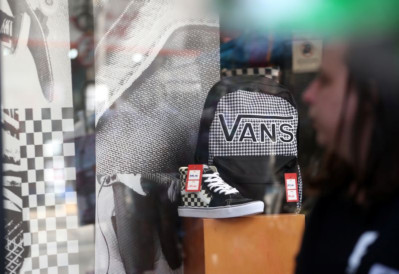 &copy; Reuters. FILE PHOTO: Shoes and backpack of Vans are seen in a shop window in Sao Paulo, Brazil August 29, 2019. REUTERS/Rahel Patrasso