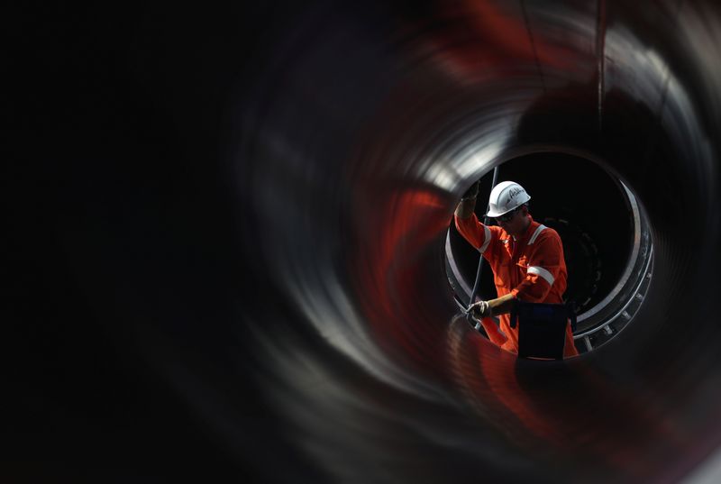 &copy; Reuters. A worker is seen through a pipe at the construction site of the Nord Stream 2 gas pipeline, near the town of Kingisepp, Leningrad region, Russia, June 5, 2019. REUTERS/Anton Vaganov