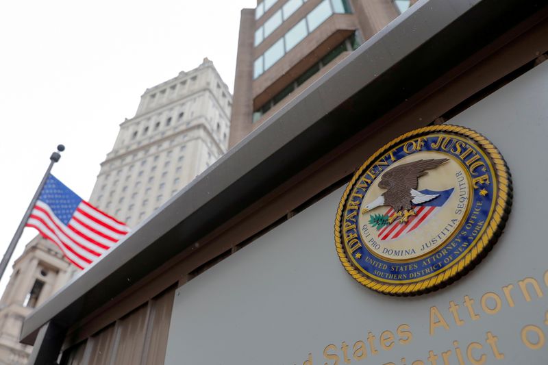 &copy; Reuters. FILE PHOTO: The seal of the United States Department of Justice is seen on the building exterior of the United States Attorney's Office of the Southern District of New York in Manhattan, New York City, U.S., August 17, 2020. REUTERS/Andrew Kelly