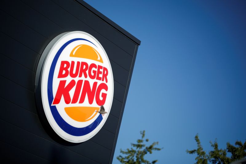 &copy; Reuters. FILE PHOTO: The Burger King company logo stands on a sign outside a restaurant in Bretigny-sur-Orge, near Paris, France, July 30, 2020. REUTERS/Benoit Tessier/File Photo