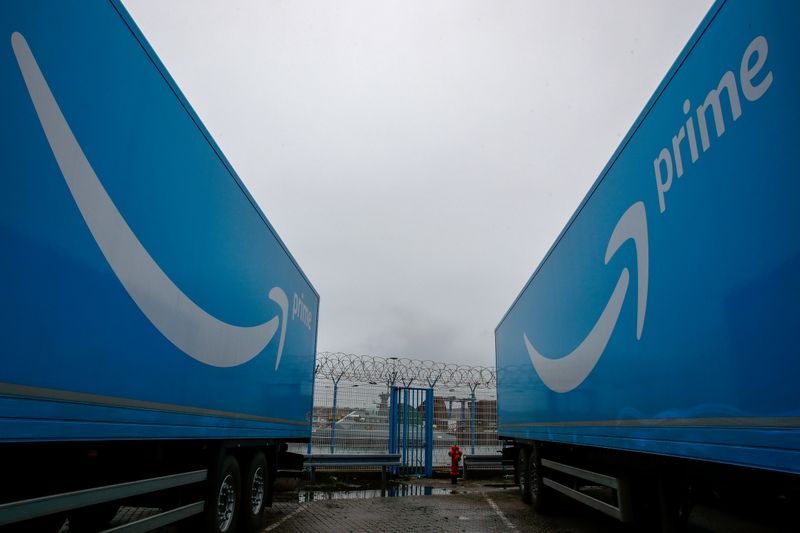 © Reuters. FILE PHOTO: Amazon trailer trucks are seen at Cherbourg Harbour, France, January 21, 2021. REUTERS/Gonzalo Fuentes