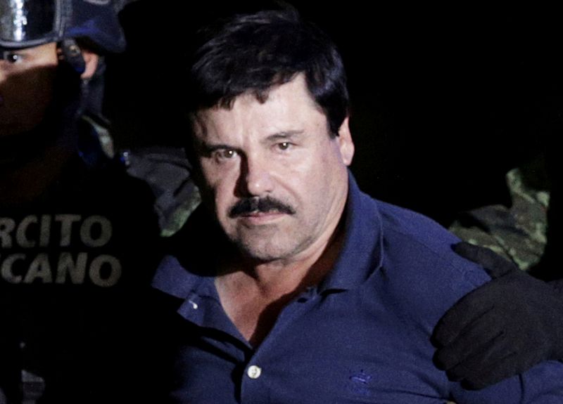 &copy; Reuters. FILE PHOTO: Recaptured drug lord Joaquin "El Chapo" Guzman is escorted by soldiers at the hangar belonging to the office of the Attorney General in Mexico City, Mexico January 8, 2016. REUTERS/Henry Romero/File Photo/File Photo