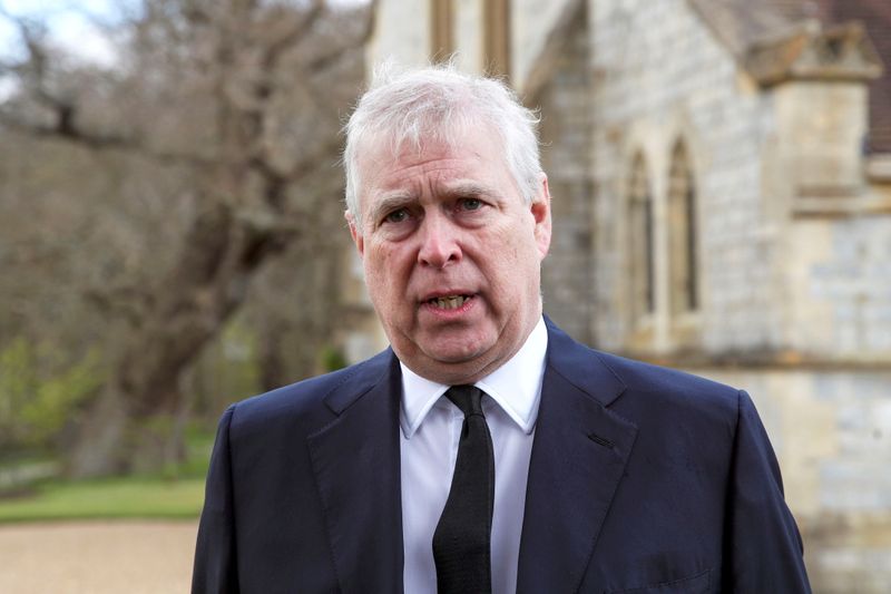 &copy; Reuters. FILE PHOTO: Britain's Prince Andrew speaks to the media during Sunday service at the Royal Chapel of All Saints at Windsor Great Park, Britain following Friday's death of his father Prince Philip at age 99, April 11, 2021. Steve Parsons/PA Wire/Pool via R