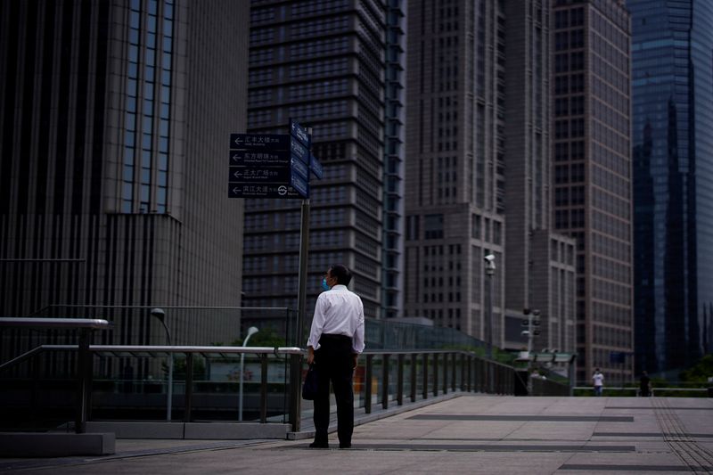 &copy; Reuters. 中国のリスク管理コンサルティング会社、Ｄ─Ｕｎｉｏｎが公表したデータによると、中国企業の間で金融リスクをヘッジする動きが広がっている。写真は上海の金融地区で昨年６月撮影（