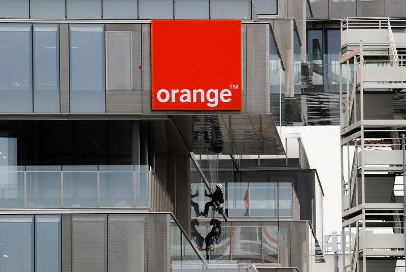 &copy; Reuters. FILE PHOTO: The logo of French telecom operator Orange is seen at the construction site of the new Orange telecommunications company headquarters in Issy-les-Moulineaux near Paris, France, February 16, 2021. REUTERS/Gonzalo Fuentes