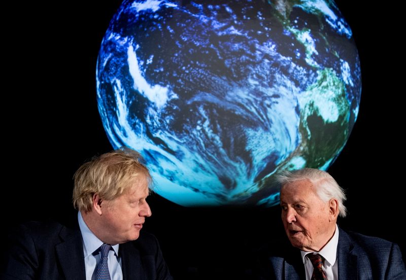 &copy; Reuters. FILE PHOTO: British Prime Minister Boris Johnson and David Attenborough speak with school children during a conference about the COP26 UN Climate Summit, at the Science Museum in London, Britain February 4, 2020. Chris J Ratcliffe/Pool via REUTERS