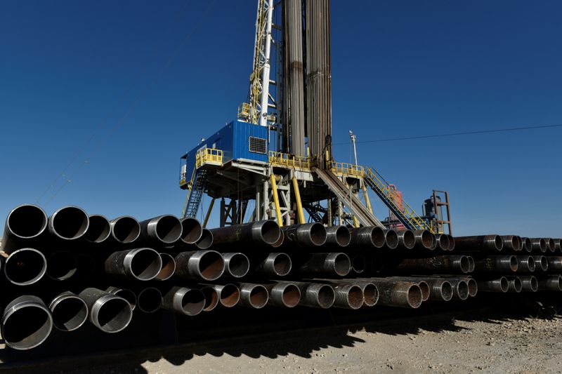 &copy; Reuters. FILE PHOTO: Drill pipe is seen below a drilling rig on a lease owned by Oasis Petroleum in the Permian Basin near Wink, Texas U.S. August 22, 2018.  Picture taken August 22, 2018. REUTERS/Nick Oxford