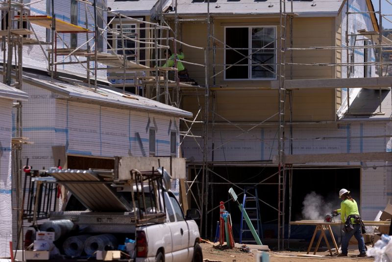 &copy; Reuters. FILE PHOTO: Residential single family homes construction by KB Home are shown under construction in the community of Valley Center, California, U.S. June 3, 2021.   REUTERS/Mike Blake/File Photo