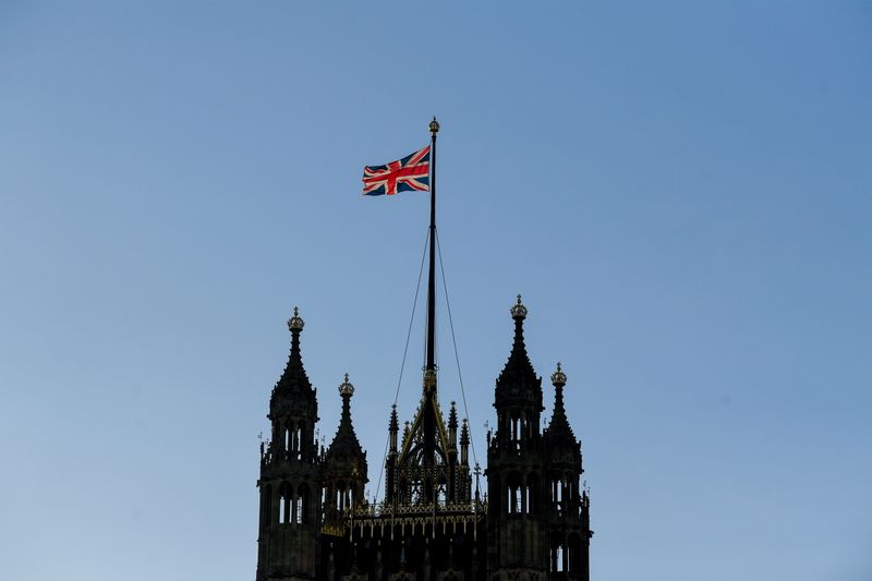 &copy; Reuters. FILE PHOTO: The British union flag flutters on the Victoria Tower at the Houses of Parliament, as Parliament is recalled to ratify legislation confirming Britain’s departure from the European Union, in London, Britain December 30, 2020. REUTERS/Toby Mel