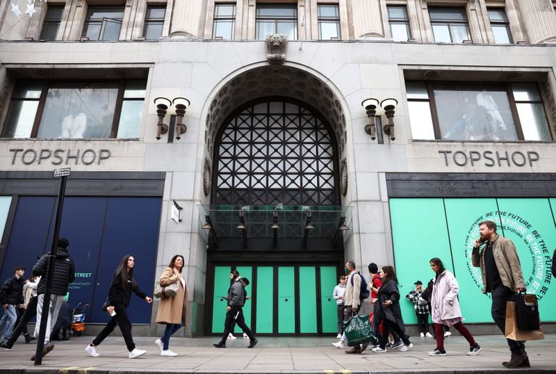 © Reuters. People walk past 214 Oxford Street, the former flagship store of British fashion chain Topshop, that has been purchased by the Swedish furniture brand IKEA, in London, Britain, October 26, 2021. REUTERS/Henry Nicholls