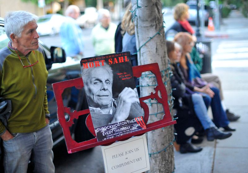 © Reuters. FILE PHOTO: A sign inviting people to watch comedian Mort Sahl speak is pictured outside the Throckmorton Theatre in Mill Valley, California August 14, 2014.    REUTERS/Josh Edelson 