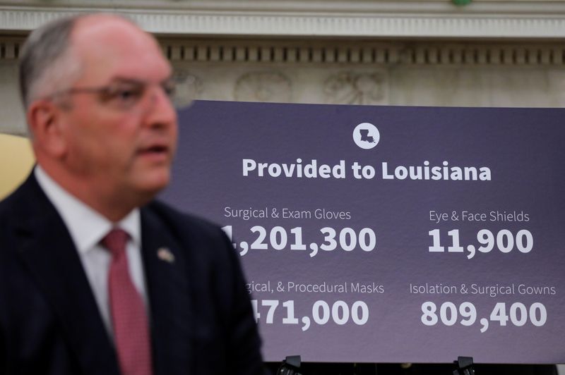 Louisiana governor lifts indoor mask mandate except for K-12 schools