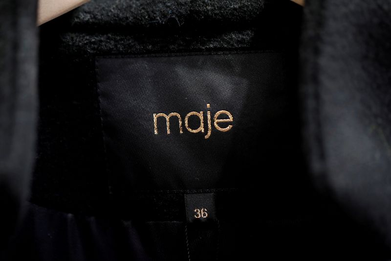 &copy; Reuters. FILE PHOTO: A Maje label is pictured on clothes inside a Maje luxury clothing store, operated by SMCP Group, in Paris, France, December 21, 2017. REUTERS/Benoit Tessier