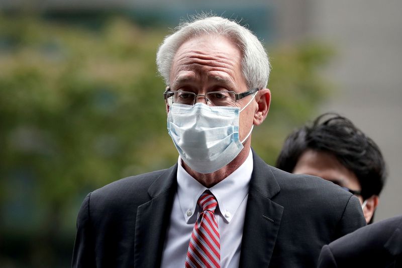 &copy; Reuters. FILE PHOTO: Greg Kelly, former representative director of Nissan Motor Co., arrives for the first trial hearing at the Tokyo District Court in Tokyo, Japan, September 15, 2020. Kiyoshi Ota/Pool via REUTERS