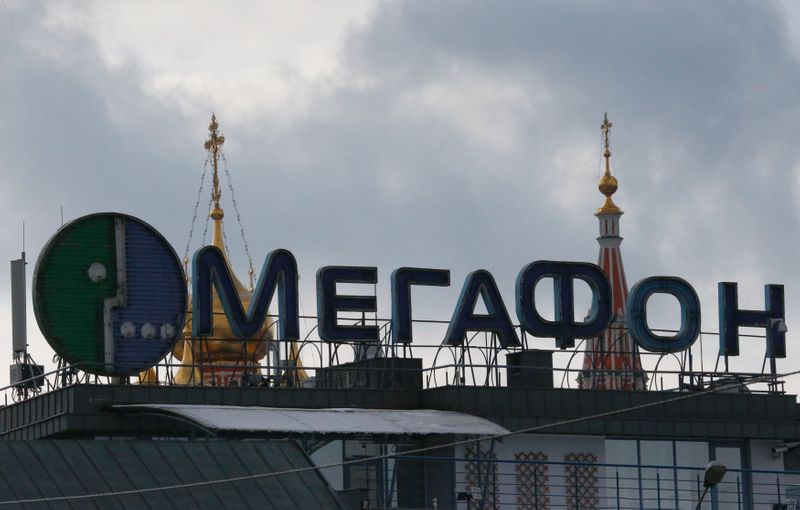 &copy; Reuters. An advertising board with logo of Russian mobile phone operator MegaFon is installed on the roof of a building in Moscow, Russia, February 27, 2016. REUTERS/Grigory Dukor