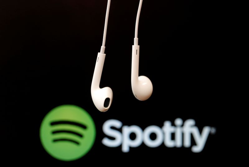 &copy; Reuters. FILE PHOTO: Headphones are seen in front of a logo of online music streaming service Spotify in this illustration picture taken in Strasbourg, February 18, 2014. REUTERS/Christian Hartmann/File Photo