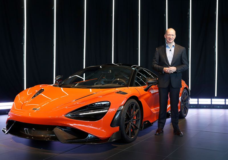 &copy; Reuters. FILE PHOTO: CEO of McLaren Automotive Limited, Mike Flewitt, poses for a photograph with the McLaren 765LT at its launch at the McLaren headquarters in Woking, Britain, March 3, 2020. REUTERS/Peter Nicholls