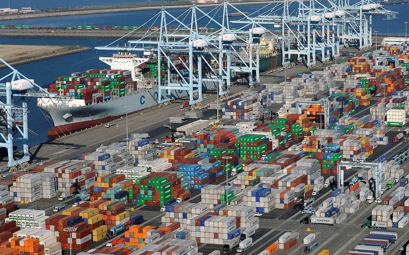 &copy; Reuters. FILE PHOTO: Shipping containers sit at the ports of Los Angeles and Long Beach, California in this aerial photo taken February 6, 2015.  REUTERS/Bob Riha, Jr./