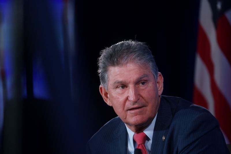 &copy; Reuters. FILE PHOTO: U.S. Senator Joe Manchin (D-WV) participates in a discussion with billionaire philanthropist David Rubenstein, President of The Economic Club of Washington in Washington, U.S., October 26, 2021. REUTERS/Leah Millis/File Photo