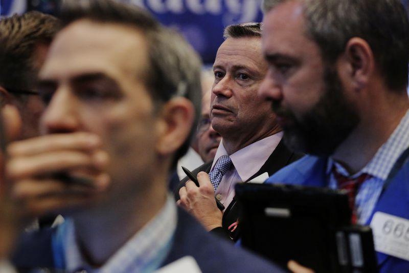 &copy; Reuters. La Bourse de New York a fini en ordre dispersé mercredi. L'indice Dow Jones a cédé 0,74%. /Photo d'archives/REUTERS/Lucas Jackson