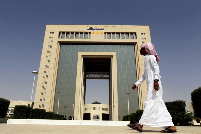 &copy; Reuters. FILE PHOTO: A man walks past the headquarters of Saudi Basic Industries Corp (SABIC) in Riyadh, Saudi Arabia October 27, 2013. REUTERS/Faisal Al Nasser/File Photo