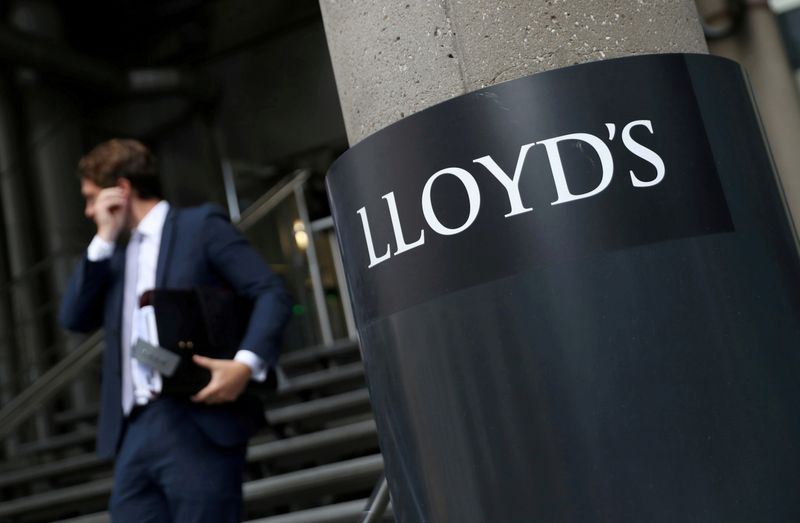 &copy; Reuters. FILE PHOTO: A man walks out of Lloyd's of London's headquarters in the City of London, Britain, July 31, 2018. REUTERS/Simon Dawson//File Photo