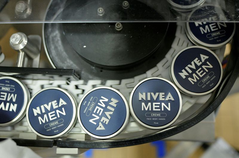 &copy; Reuters. FILE PHOTO: Nivea tins are seen on a production line at the plant of German personal care company Beiersdorf in Hamburg, Germany, March 3, 2017. REUTERS/Fabian Bimmer