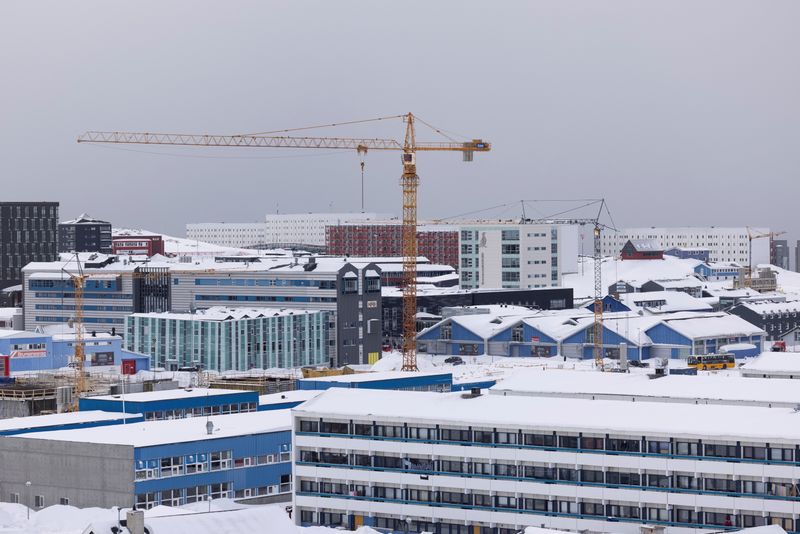 &copy; Reuters. FILE PHOTO: Construction cranes are seen in Nuuk, Greenland March 25, 2021. Ritzau Scanpix/Christian Klindt Soelbeck via REUTERS 