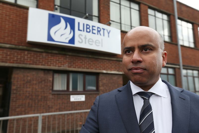 &copy; Reuters. FILE PHOTO: Liberty Steel boss Sanjeev Gupta stands outside steel pressing mill in Dalzell after completing its purchase, Scotland, Britain April 8, 2016. REUTERS/Russell Cheyne/File Photo
