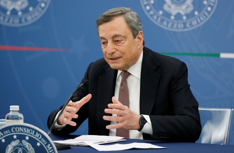 Italy's Draghi cuts taxes, raises retirement age in first budget