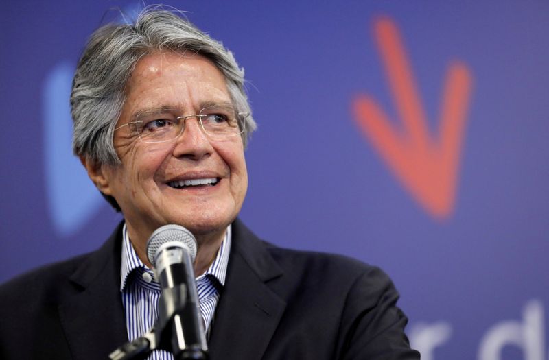 © Reuters. FILE PHOTO: Ecuador's President-elect Guillermo Lasso reacts as he speaks to media in Quito, Ecuador April 12, 2021. REUTERS/Luisa Gonzalez