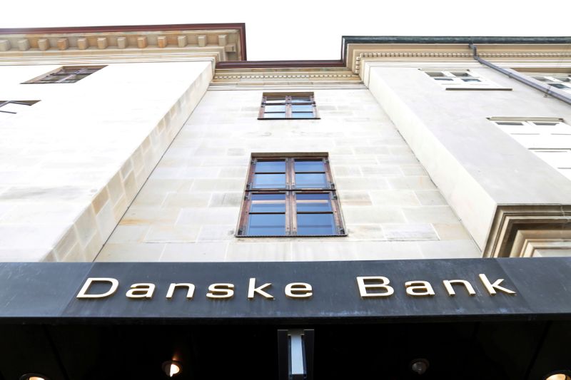 Danske Bank shares slide after cut to profitability target