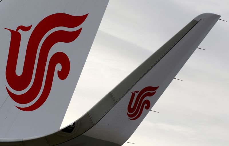 &copy; Reuters. FILE PHOTO: The logo of Air China is pictured on a tail of an airplane parked at the headquarters of Airbus in Colomiers near Toulouse, France, November 15, 2019. REUTERS/Regis Duvignau/File Photo