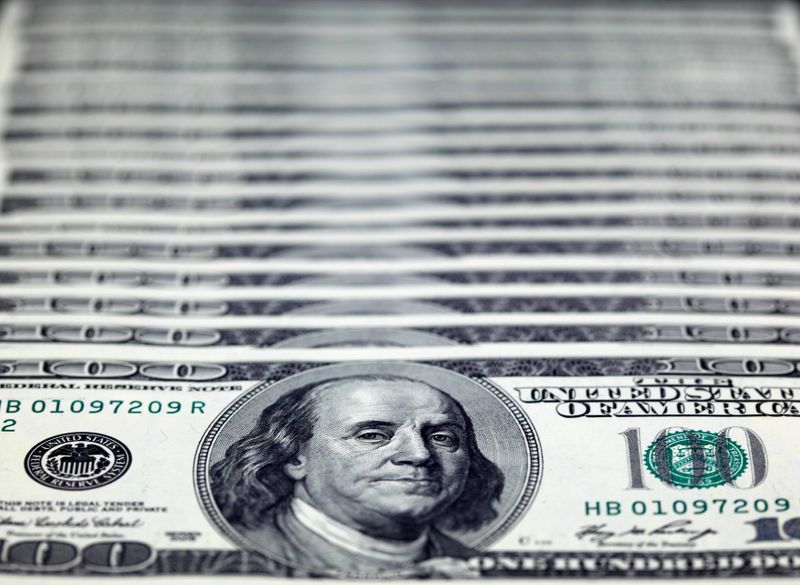 &copy; Reuters. FILE PHOTO: U.S. dollar notes are seen in this picture illustration taken at the Bank of Taiwan in Taipei November 11, 2010. REUTERS/Nicky Loh 