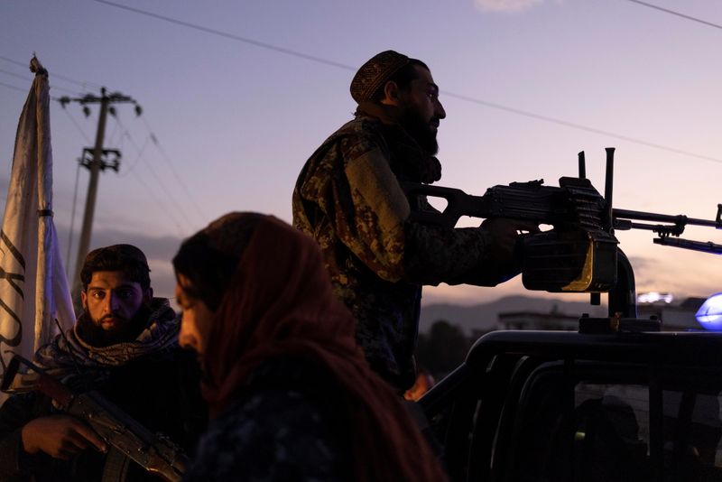 &copy; Reuters. FILE PHOTO: Taliban members in charge of security, patrol in Kabul, Afghanistan October 28, 2021. REUTERS/Jorge Silva