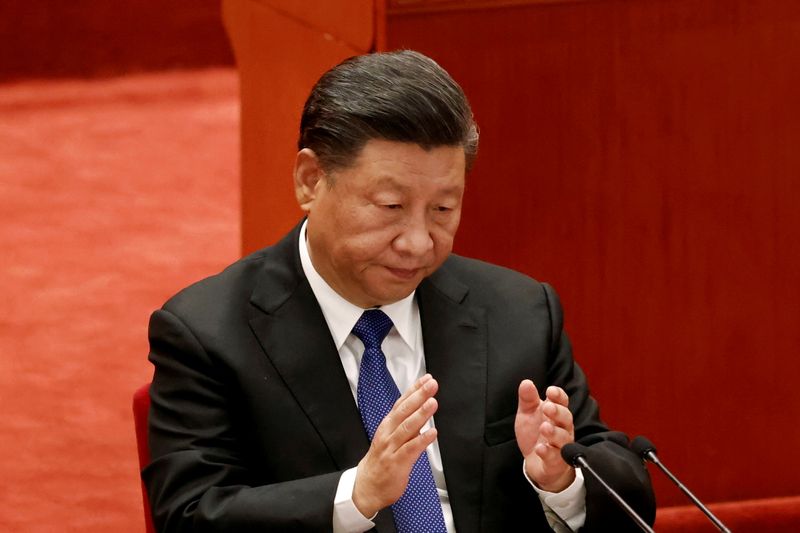&copy; Reuters. FILE PHOTO: Chinese President Xi Jinping applauds at a meeting commemorating the 110th anniversary of Xinhai Revolution at the Great Hall of the People in Beijing, China October 9, 2021. REUTERS/Carlos Garcia Rawlins/File Photo
