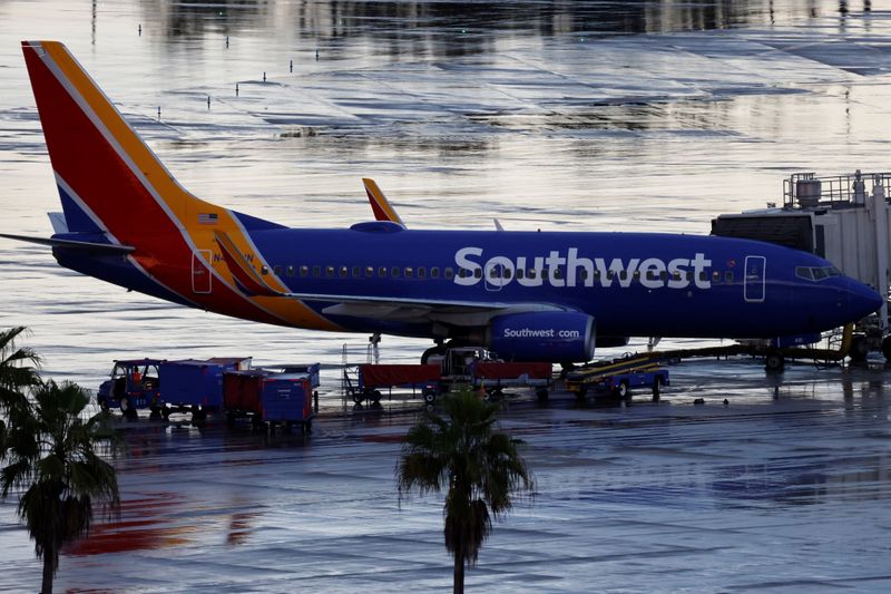 &copy; Reuters. FILE PHOTO: A Southwest Airlines jet sits at a gate at Orlando International Airport in Orlando, Florida, U.S., October 11, 2021 . REUTERS/Joe Skipper