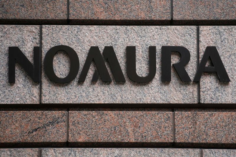 Japan's Nomura slumps as legacy transaction charge hit quarterly profit