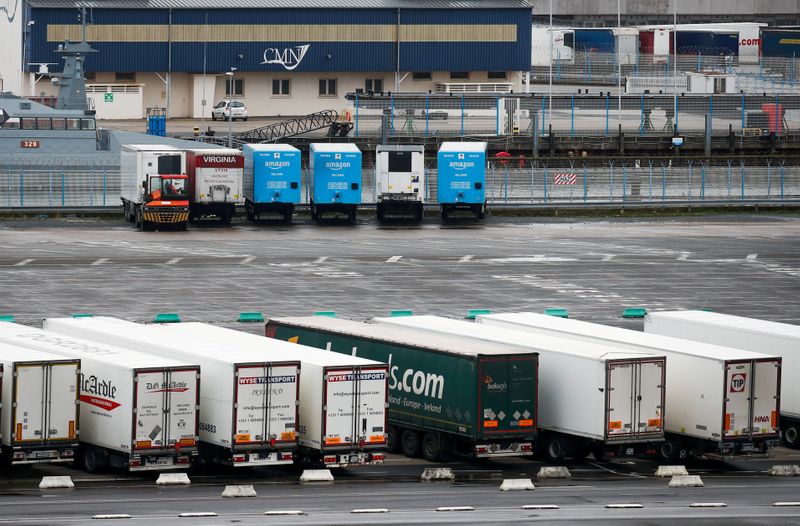 &copy; Reuters. FILE PHOTO: Amazon trailer trucks are seen at Cherbourg Harbour, France January 21, 2021. Brexit delays and customs checks have led to a surge in demand to ship goods in and out of Ireland direct to European ports like Cherbourg in France. REUTERS/Gonzalo