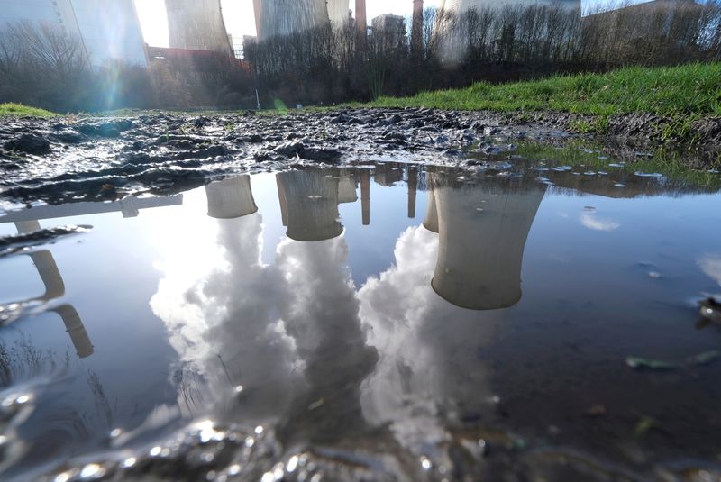 &copy; Reuters. FILE PHOTO: The lignite (brown coal) power plant complex of German energy supplier and utility RWE is reflected in a puddle in Neurath, north-west of Cologne, Germany, February 5, 2020.    REUTERS/Wolfgang Rattay//File Photo