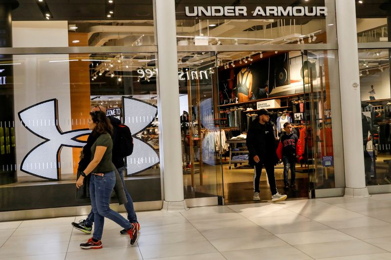 &copy; Reuters. FILE PHOTO: Customers exit an Under Armour store in New York City, U.S., November 4, 2019. REUTERS/Brendan McDermid/File Photo/File Photo